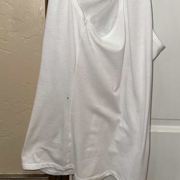 White tank “. Personally victimized by my Trainer”. - Picture 5 of 8